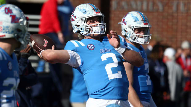 Ole Miss quarterback Jaxson Dart warms up at Vaught-Hemingway Stadium in Oxford, Miss.